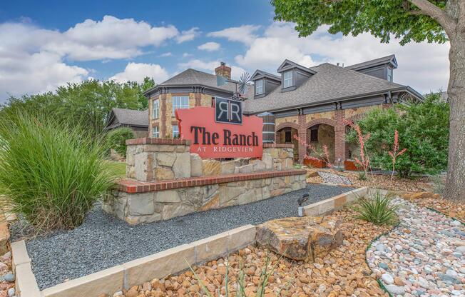 a train is parked on the side of a house