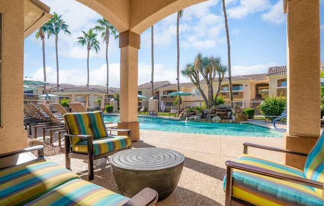 Poolside cabana with ample seating - Arrowhead Landing Apartments