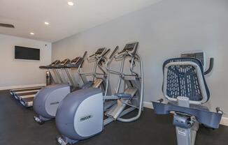 an office with a desk and chair in a room