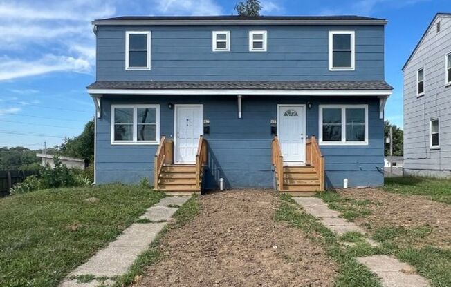 Modern 2-Bed, 1-Bath Duplex with Garage & Basement Storage