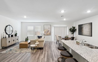 living room and dining room with contemporary furnitures and white walls