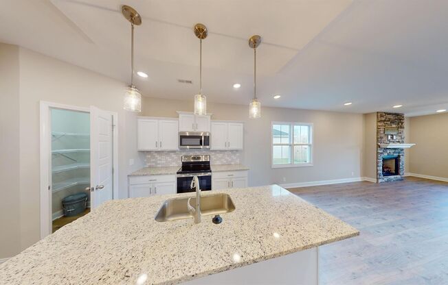 Stylish Home with Feature Stone Front Fireplace, Open Layout and Premium Upgrades