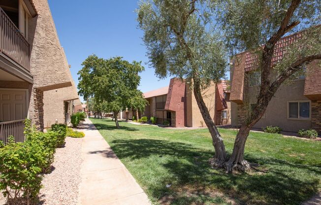 First floor unit in guard gated SW community with pool, spa, exercise room, tennis