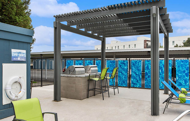 Outdoor BBQ Area with Furniture at Meritage Apartments in Vallejo, CA.