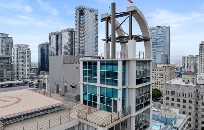 a view of the city from the top of a tall building