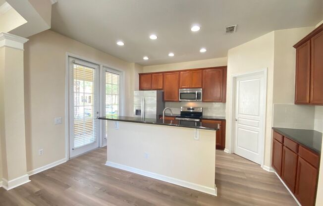 Great location, corner model, 3B/2.5B townhouse in desired neighborhood with community pool!
