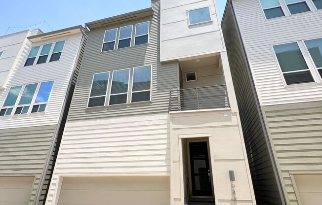 Incredible 4-Story Modern 3/3.5/2 Home in Gated Community in Shady Acres!