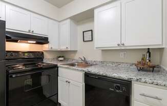 This is a photo of the kitchen in a 560 square foot, 1 bedroom, 1 bath apartment at Aspen Village Apartments in Cincinnati, OH.