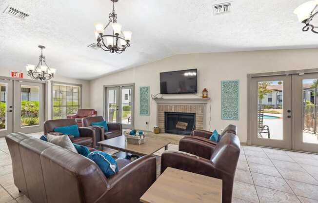 a living room with a rug and a fireplace