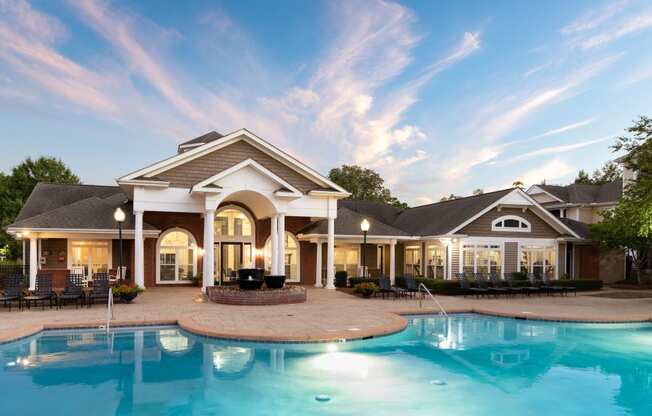 Exterior View of Pool and Clubhouse at Abberly Woods Apartment Homes, Charlotte, NC 28216