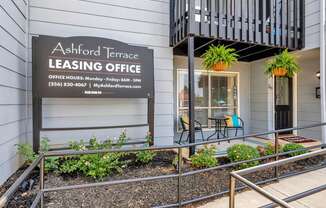 the entrance to the leasing office building