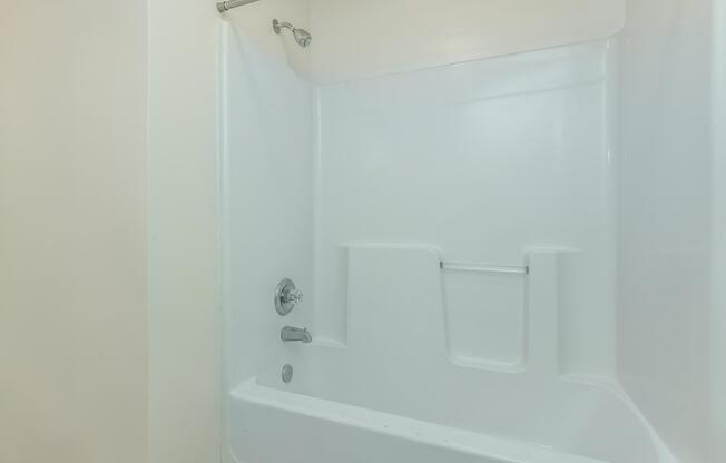 a room with a sink and a shower