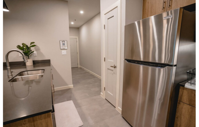 2 beds, 2 baths, 1,037 sqft, $1,225, Unit B-04/WHITE CABINET/ PARKING LOT VIEW