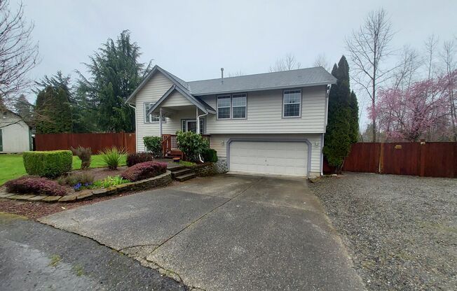 4 bedroom 2.75 bath, Huge Fenced Yard with Landscaping Included!!