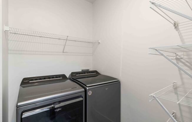 the laundry room is equipped with a washer and dryer