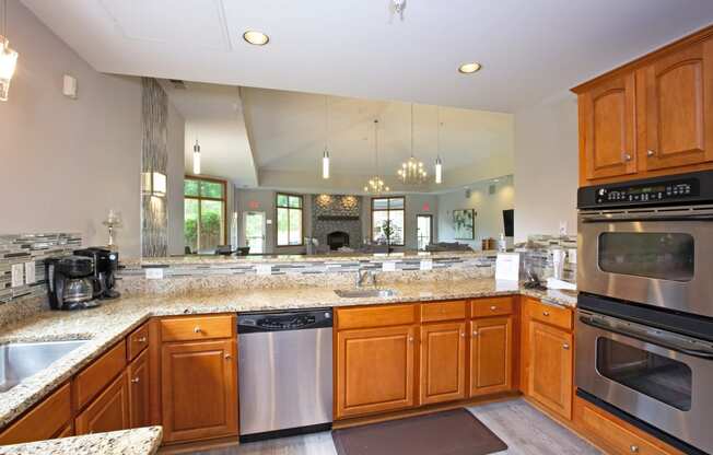 Laurel East End Apartments in Golden Valley, MN photo of a large kitchen with granite counter tops and stainless steel appliances