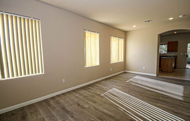Great 4 Bedroom 2 1/2 Bath home that features a Strip View from the Master Bedroom, a Large Open kitchen. Move in ready