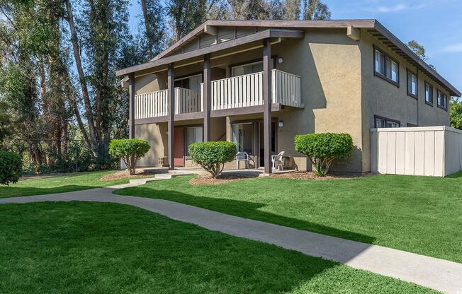 a large lawn in front of a house