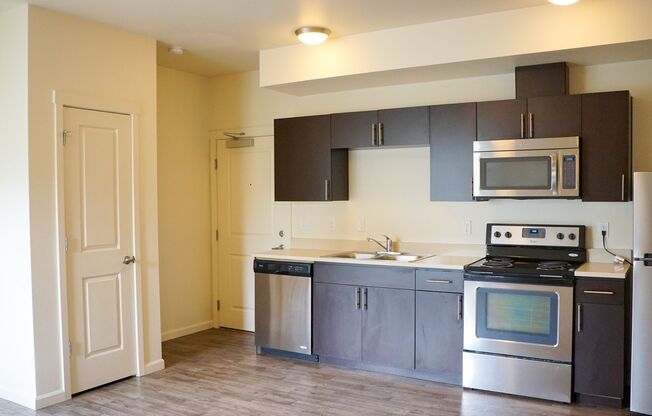 Modern 1 Bedroom with A/C + Private Balcony Ready Late July!