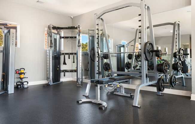 a gym with a lot of equipment