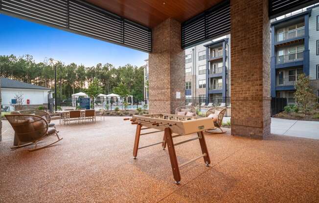 play a game of foosball on our patio at Preston Ridge, North Carolina