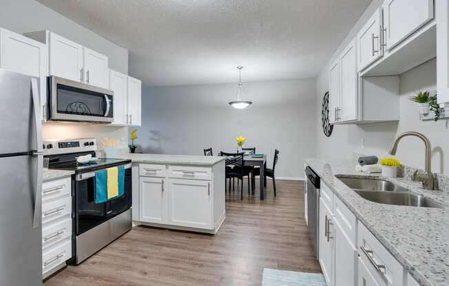 Kitchen Featuring Vinyl Wood-Style Flooring