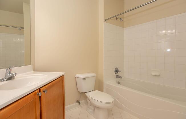 a room with a sink and a bath tub