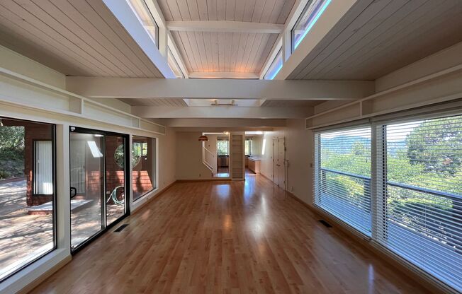DELIGHTFUL FOUR BEDROOM TWO AND HALF BATH HOME IN WEST CORTE MADERA WITH STUNNING MT TAM VIEWS