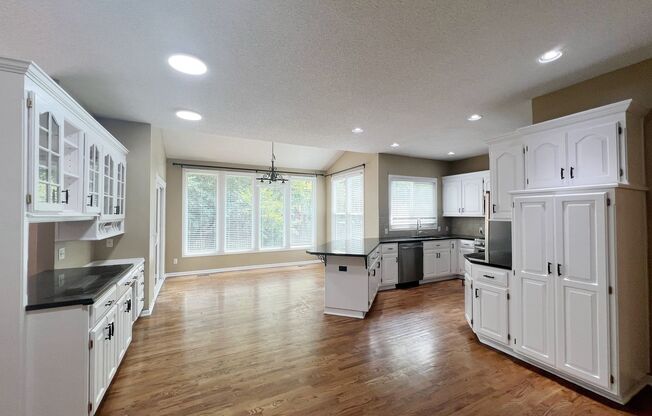 SEE IT NOW: Spacious 4-Bed Home with Finished Basement & 3-Car Garage!