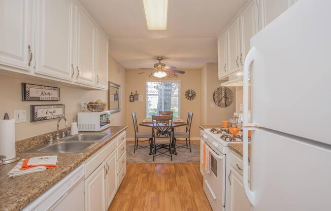 COMPLETE KITCHEN WITH DISHWASHER, PANTRY, AND GRANITE COUNTERTOPS