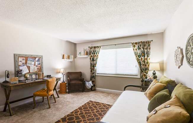 Secondary bedroom in a signature series 2-bed, 2-bath apartment at Somerset Lakes, featuring ample space and natural light.
