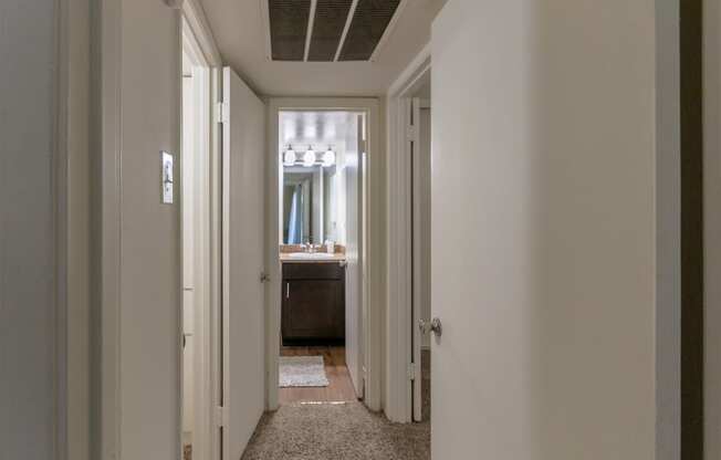 This is a photo of the hallway of the 590 square foot 1 bedroom, 1 bath model apartment at The Biltmore Apartments located int he Vickery Meadow neighborhood of Dallas, TX.