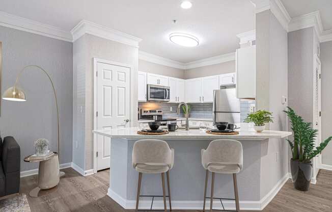 The Asher at Sugarloaf apartments in Lawrenceville Georgia photo of upgraded kitchen