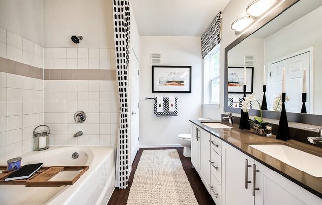 Bathroom With Bathtub And Abundant Storage at Reflections by Windsor, Redmond, Washington