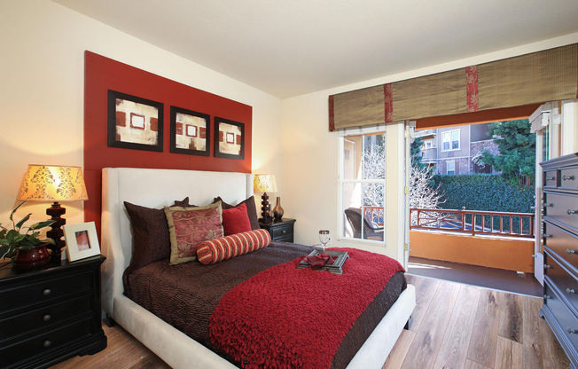 a living room filled with furniture and a flat screen tv