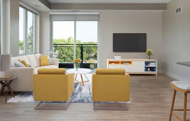 A living room with a white couch, yellow chairs, and a flat screen TV.