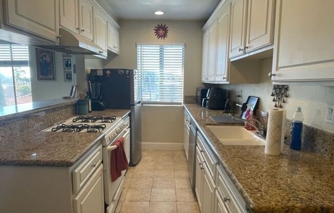 Updated 2nd Floor Corner Unit -3425 E. 15th Street, #17-D