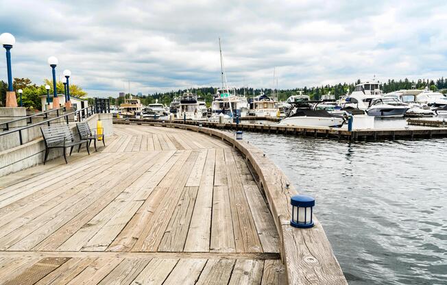 Waterfront boardwalk near Downtown Kirkland with marina views, walking paths, and access to parks, shops, and lakeside dining.