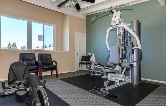 a room filled with furniture and a large window