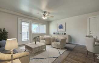 a living room with white furniture and a ceiling fan at Madison Park, Bozeman, MT, 59718