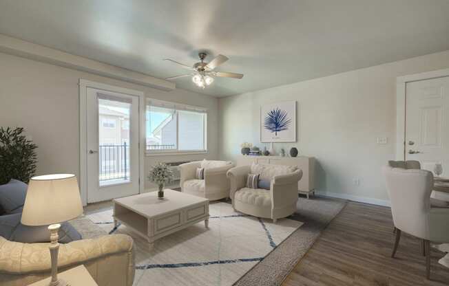 a living room with white furniture and a ceiling fan at Madison Park, Bozeman, MT, 59718