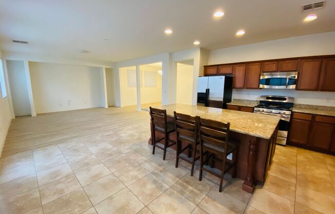 RHODES RANCH GUARD GATED 3064SQFT 5BD 3BA HOME WITH HARD FLOORING THROUGH OUT FOR RENT!