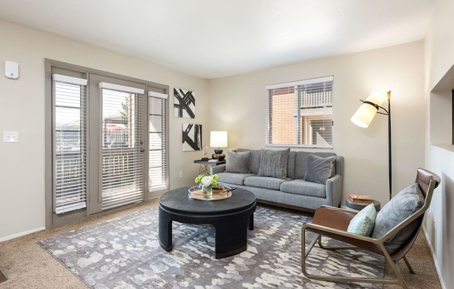 a living room with a couch and a coffee table