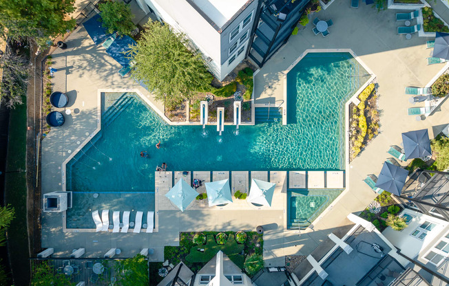 view of resort style pool with lounge chairs