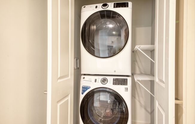 Vented washer and dryer in all units