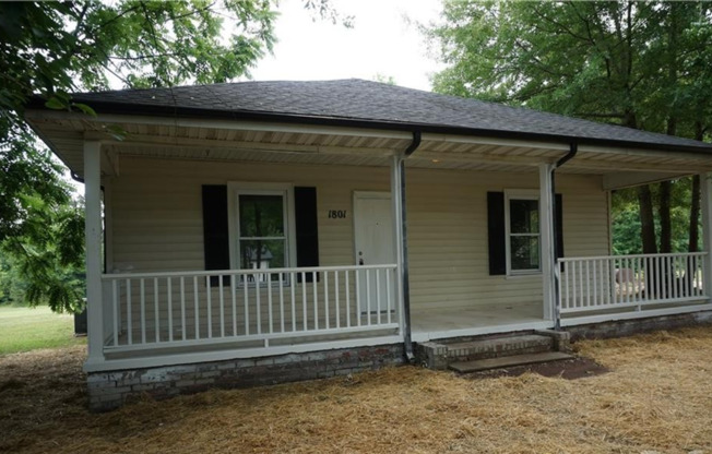 Quiet Home with Large COvered front porch and Hardwood floors!