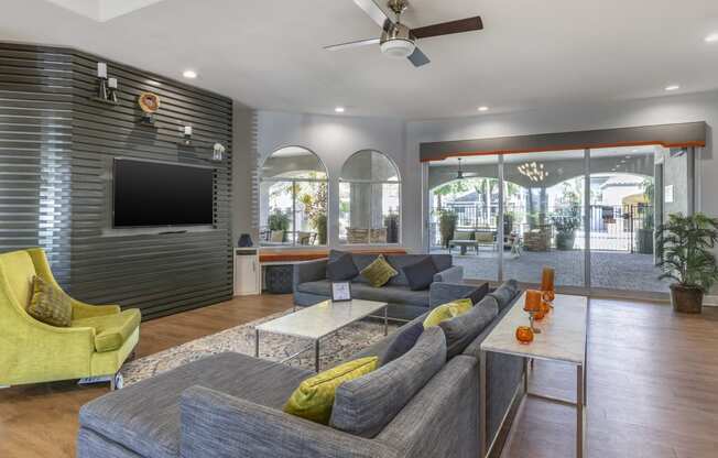 Relax in our clubhouse with top-notch seating and media perks at Boulders at Lookout Mountain Apartment Homes, Phoenix Arizona