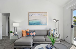 a living room with a couch and a coffee table