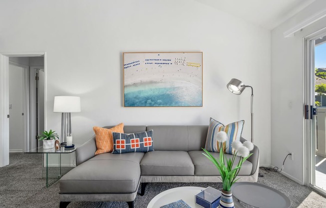 a living room with a couch and a coffee table