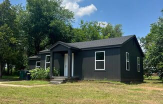 Black house on a hill